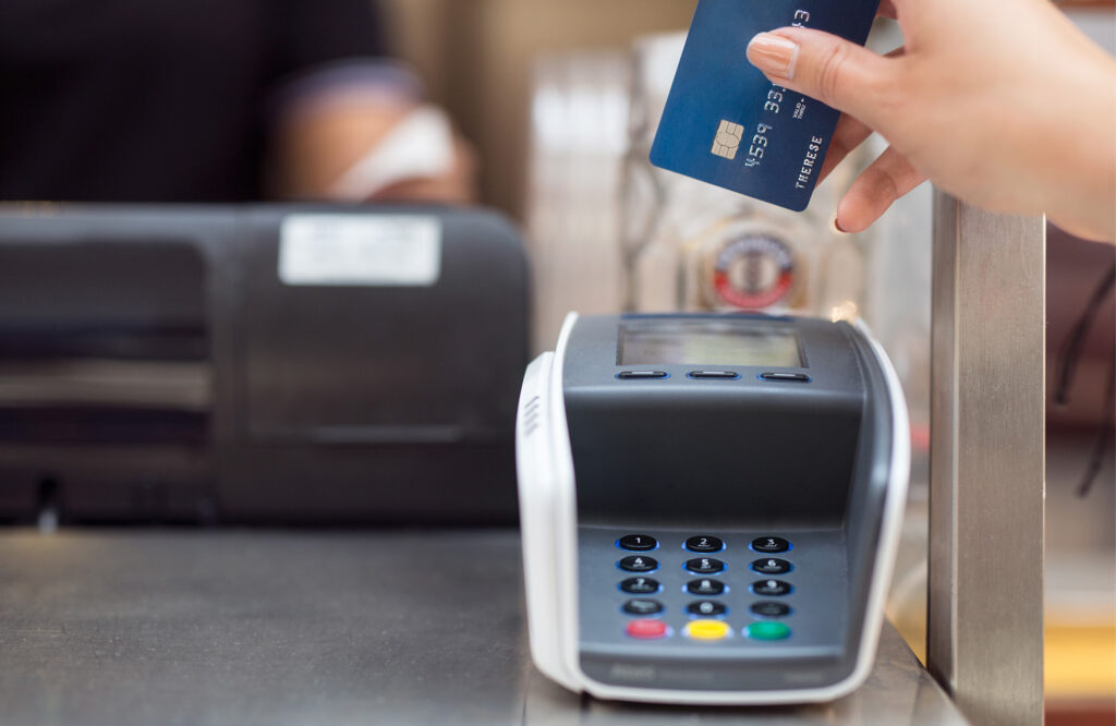 Woman paying with card